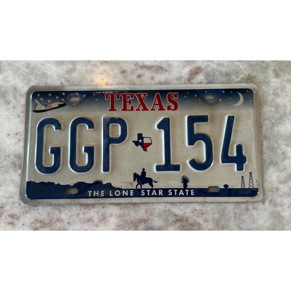 1990s Texas License Plate Embossed Space Shuttle Moon Cowboy Horse Stars GGP 154
